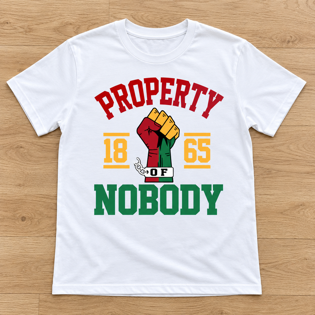 White Property of Nobody Since 1865 Tee laid flat on light wood