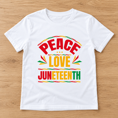 White Peace Love Juneteenth — Bold Typography Tee laid flat on light wood