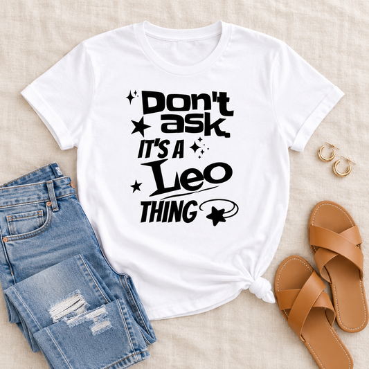 White graphic tee in a styled flat lay