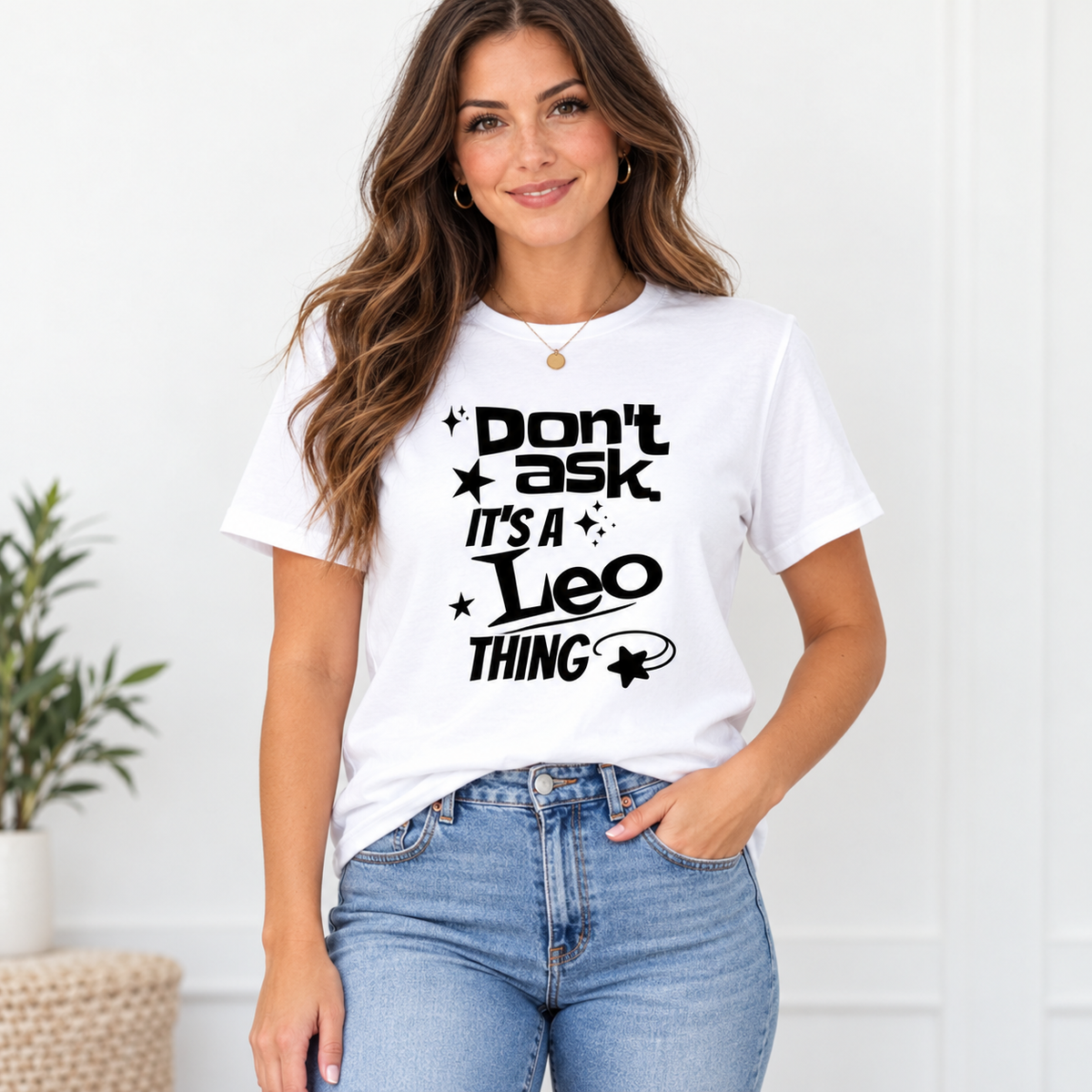 White woman wearing a white graphic tee
