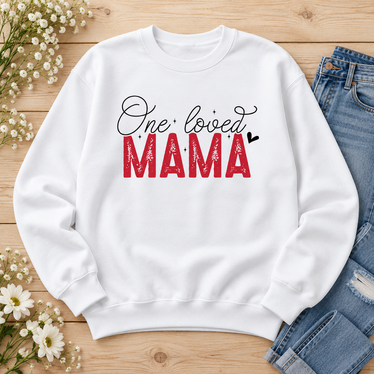 One Loved Mama Crewneck Sweatshirt — styled flat lay showing the front design