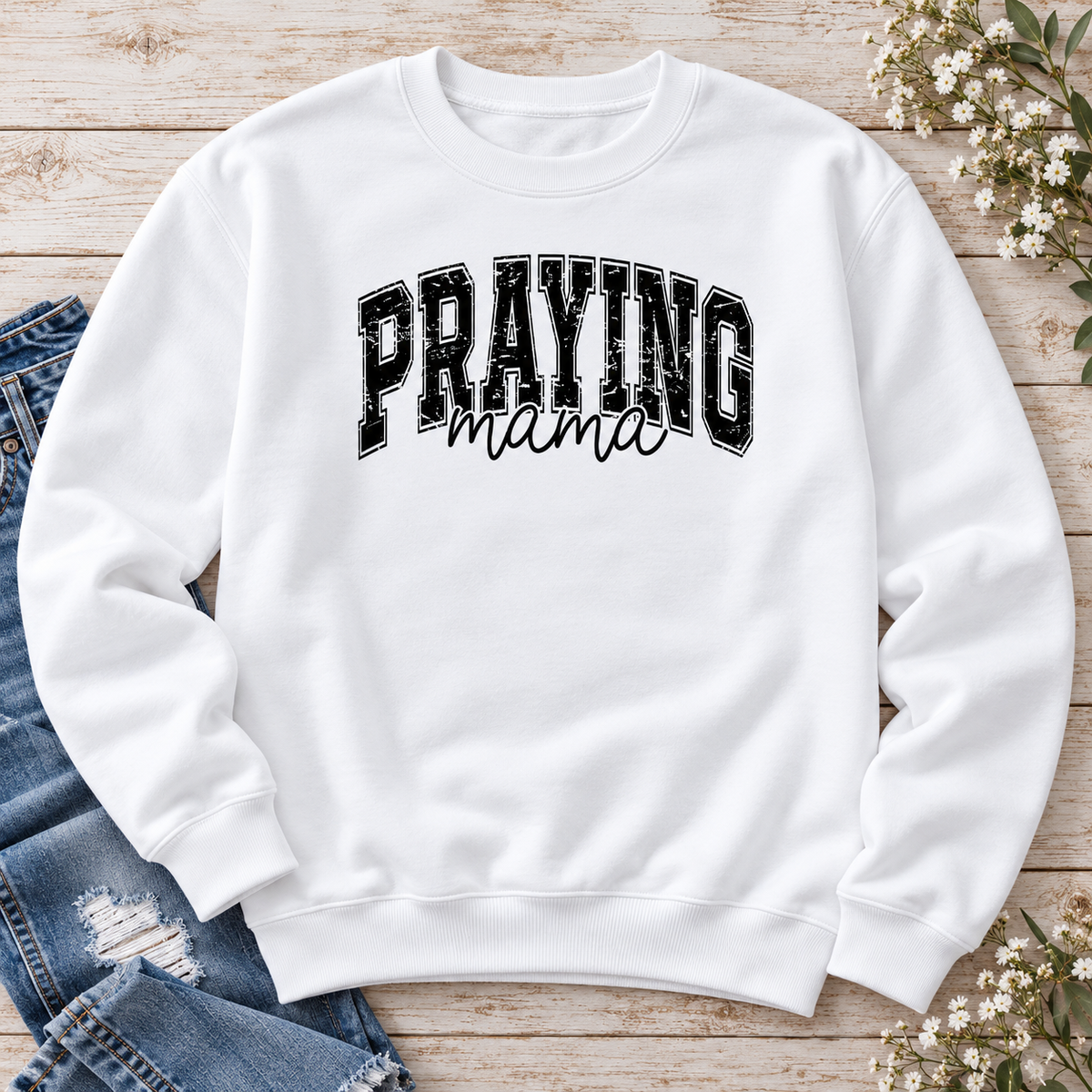 Praying Mama Crewneck Sweatshirt — styled flat lay showing the front design