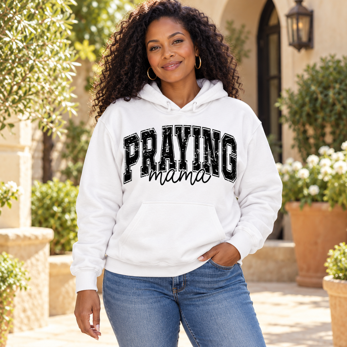 Praying Mama Hoodie — Black woman wearing the garment