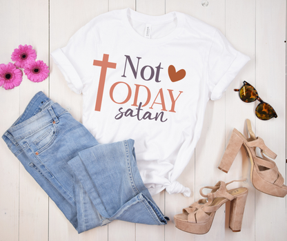 Not Today, Satan Faith Statement Tee — styled flat lay showing the front design